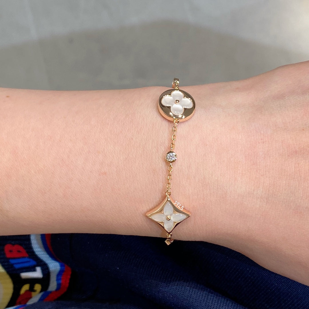 [⭐moonlume]STAR AND SUN 4 MOTIF WHITE MOP PINK GOLD BRACELET